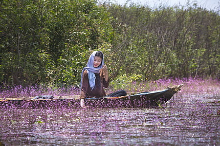 woman riding boat thumbnail