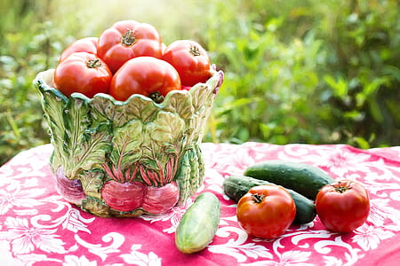shallow focus photography of tomato and cucumber thumbnail