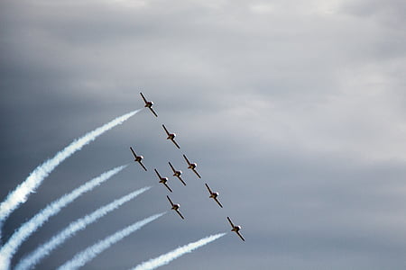 gray jet planes under white clouds thumbnail