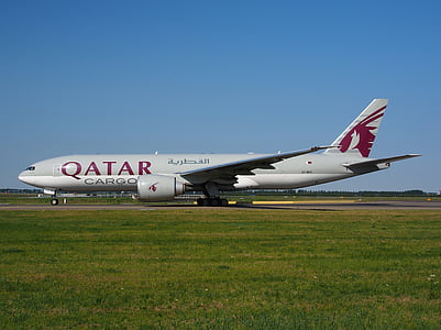 white and red Qatar cargo plane on airport thumbnail