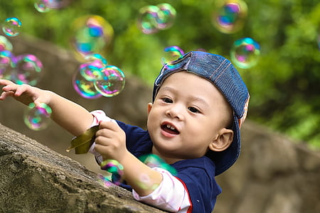 boy playing with bubbles thumbnail