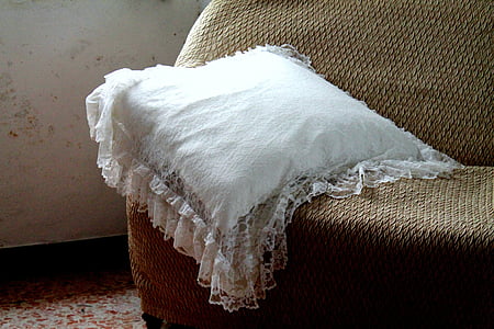 white throw pillow on sofa thumbnail