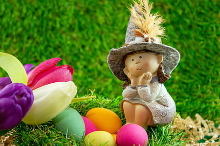 doll on green grass lawn thumbnail