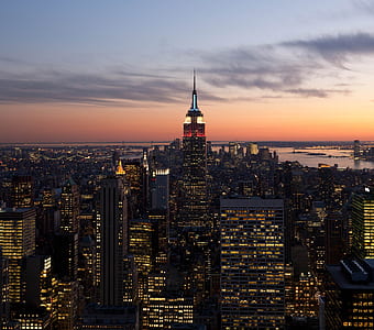 high rise buildings near body of water thumbnail