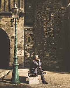 man sitting on bench thumbnail