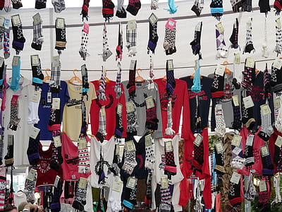 assorted clothes lot hanged on wall thumbnail