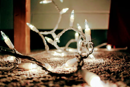 Close Up Photo of White and Black String Lights thumbnail