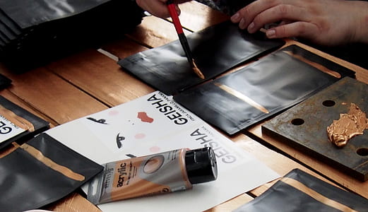 person painting on table thumbnail