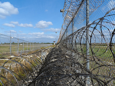 closeup photo of barbwire fence thumbnail