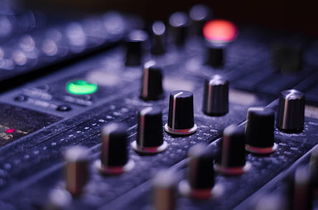 selective focus photography of mixing console thumbnail