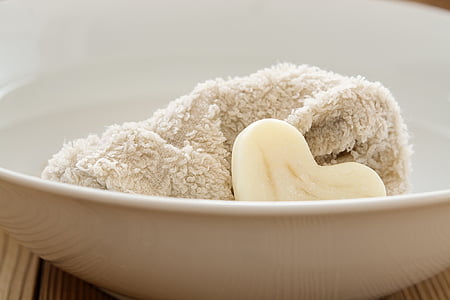 white washcloth and hard soap in basin thumbnail