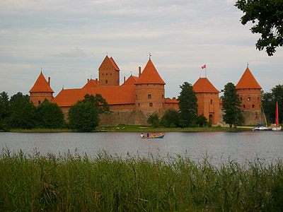 brown castle near body of water thumbnail