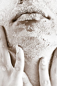 Person's Face Covered With White Powder thumbnail