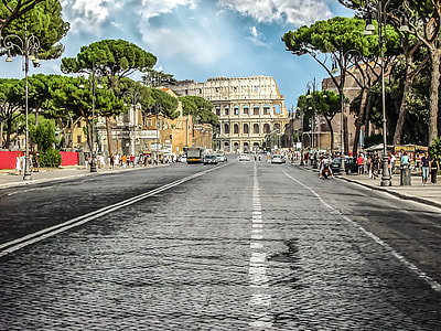 gray concrete road near Colosseum thumbnail