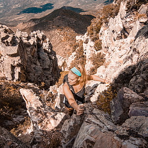woman climbing mountain thumbnail