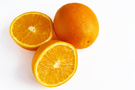 one whole and one sliced orange fruits thumbnail