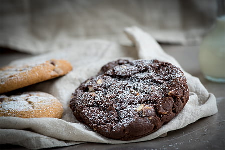 chocolate cookie on white textile thumbnail