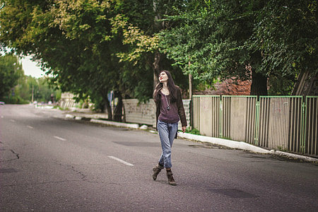 woman wearing maroon long-sleeved shirt and gray pants thumbnail