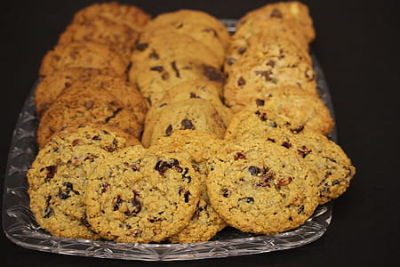 tray of baked cookies with chocolate dips thumbnail