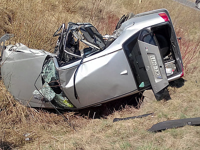 wrecked gray car on brown grass field during daytime thumbnail