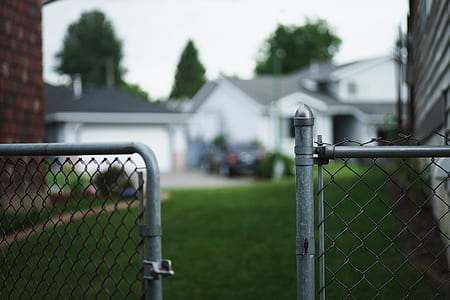 tilt shift lens photo of chain-link fence thumbnail