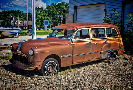 classic brown station wagon during daytime thumbnail