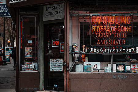 red neon signage in store front thumbnail