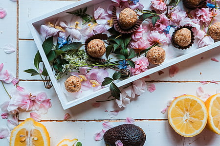food on white floral tray beside lemons thumbnail