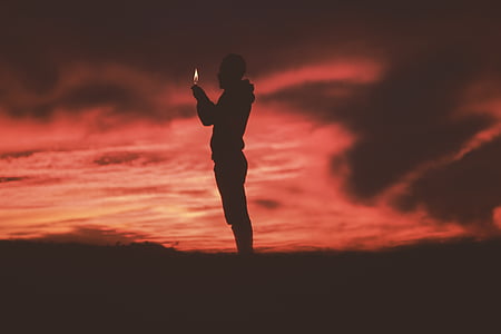 man standing on field thumbnail