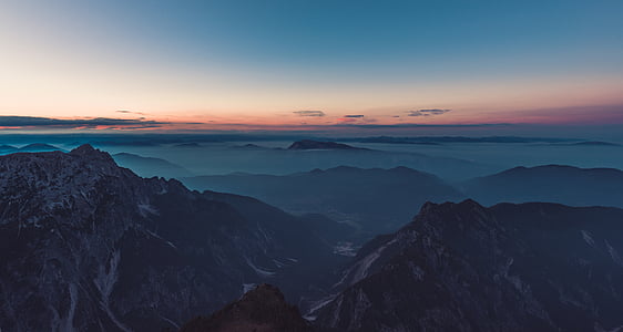 mountains under white sky thumbnail