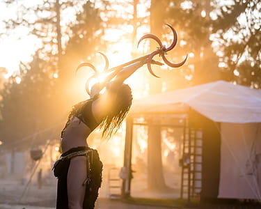 woman holding blade and raising it up thumbnail