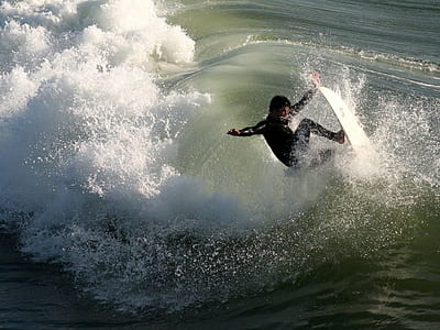 man surfing on waves thumbnail
