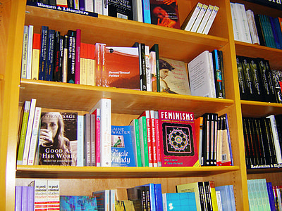 assorted-title books lot on shelf thumbnail