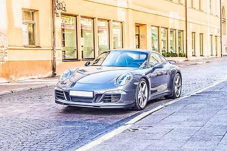 gray luxury car parked on street thumbnail