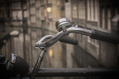 shallow focus photo of gray bike handle thumbnail