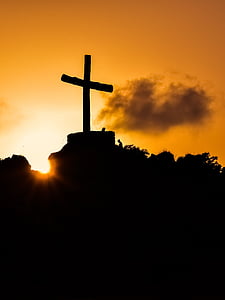 silhouette of cross during sunset thumbnail
