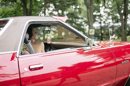 woman sitting in car thumbnail