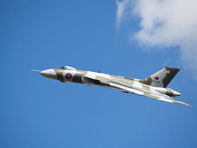 White and Grey Fighter Plane on Mid Air during Daytime thumbnail