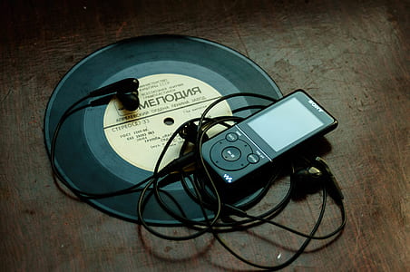 black Sony walkman on vinyl disc thumbnail