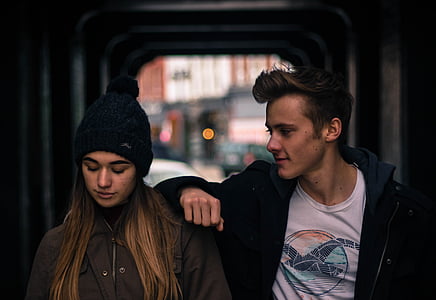 man leaning on woman's shoulder thumbnail