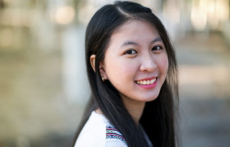 Close-Up Photography of a Woman Smiling thumbnail