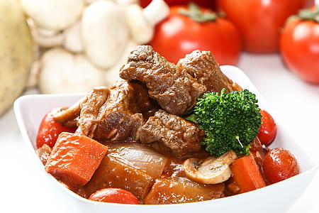 meat dish on white bowl thumbnail