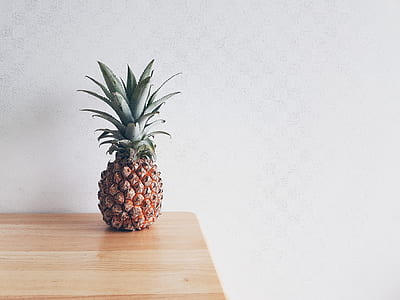 pineapple on top of table thumbnail