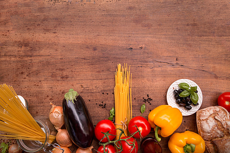 vegetables with pasta on brown surface thumbnail