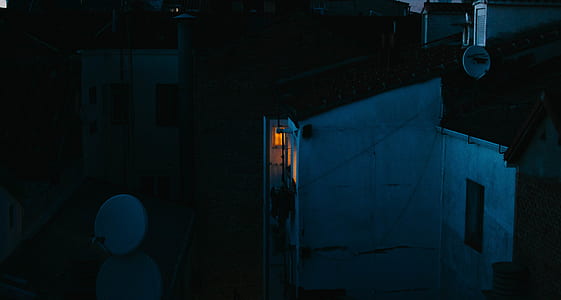 white concrete house during nighttime thumbnail