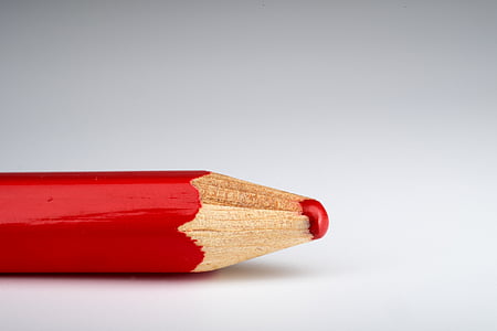 red wooden pencil on white surface thumbnail