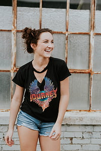 woman smiling at the photo thumbnail