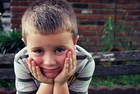 boy in white and black striped T-shirt thumbnail