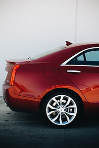 red Cadillac CTS sedan thumbnail