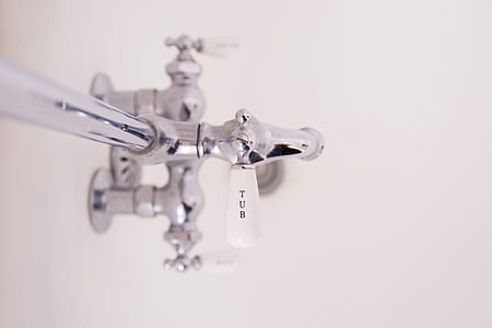tilt-shift photography of faucet thumbnail